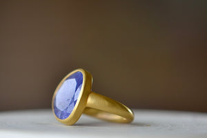 Side view of Tanzanite Greek Ring by Pippa Small.