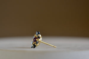 
            
                Load image into Gallery viewer, Side view of the pink and teal Daisy stud by Polly Wales.
            
        