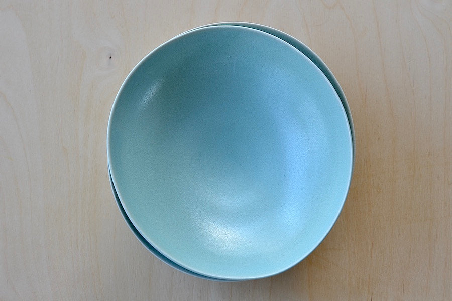 Shallow Carpel dish Plates or bowls in celadon blue by Korean ceramicist Hyejong Kim, Loewe Craft Prize finalist.