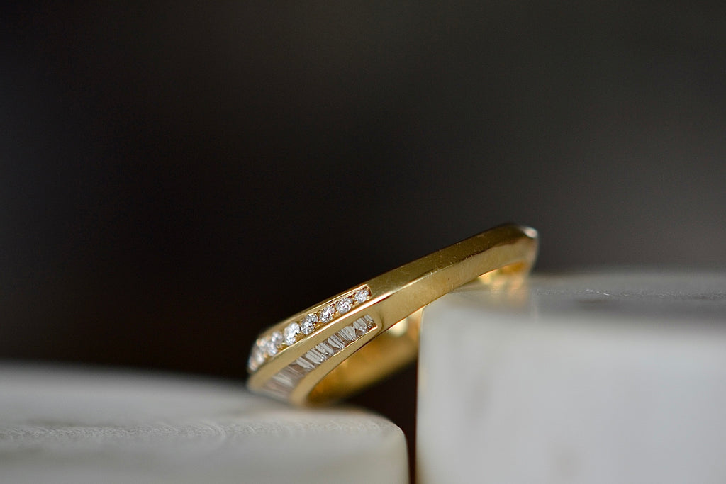 Knife edge detail of Crescent Ring with Baguette and round white diamonds by Lizzie Mandler.