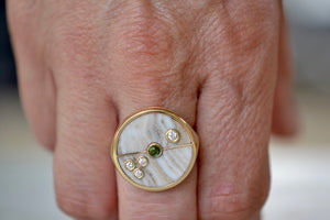Wearing the Retrouvai Champagne Agate Compass Signet ring with Diamonds and green tourmaline in 14k yellow gold inlay.