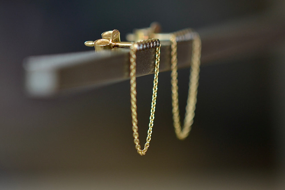 Side view of Bar and Chain earrings by Yannis Sergakis.