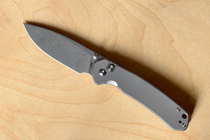 Pyrite Button Lock Titanium Knife is a button lock knife with a titanium handle, showing other side. J1925-TI by CJRB