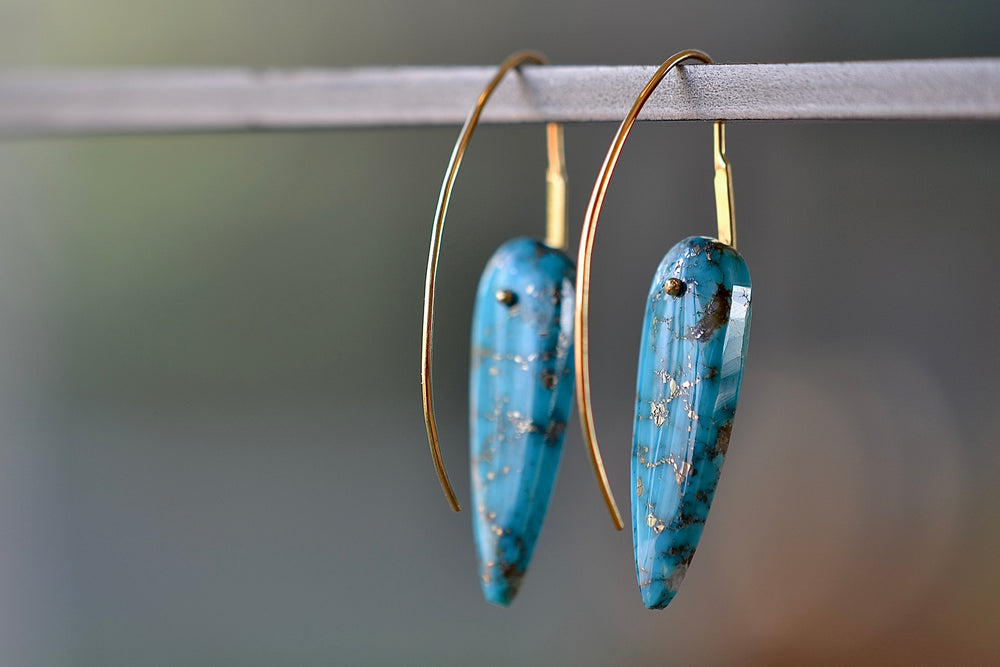 
            
                Load image into Gallery viewer, Alternate view of the feather earrings by Rachel Atherley.
            
        