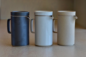 
            
                Load image into Gallery viewer, Showing the black, gray and natural tall teapots by Hasami.
            
        