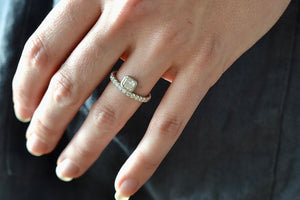 Wearing the Offset Floating Solitaire by Elizabeth Street Jewelry.