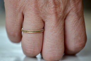 
            
                Load image into Gallery viewer, Wearing the Black Diamond Stackable Eternity Band by Lizzie Mandler.
            
        