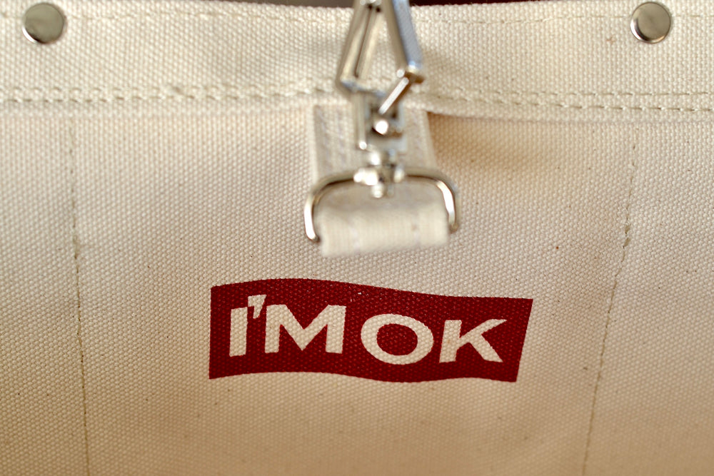 Logo inside I'M OK tote bag.
