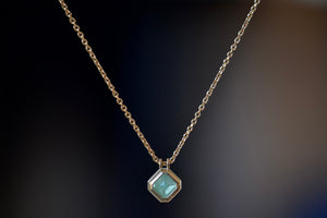 Back view of the Duo Bale Offset Emerald Necklace.