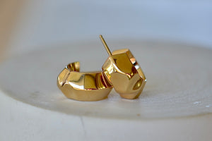 Liquid Gold Huggies by Lizzie Mandler are a chunky and organic  huggie earring called the liquid huggie in 18k yellow gold and post closure. Sold as a pair. Made in Los Angeles. 