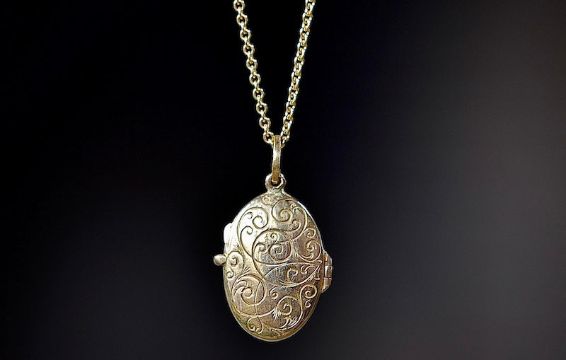 
            
                Load image into Gallery viewer, Engraved back of Arman Sarkisyan Blue Sapphire Locket.
            
        