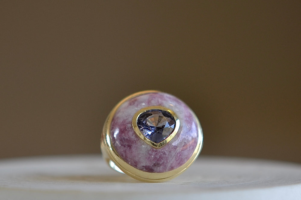 Alternate front view of the small petite lollipop ring  in trolleite and spinel by Retrouvai.