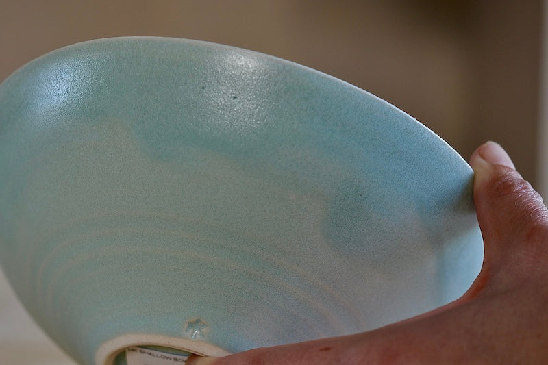 Outer rim of Shallow Plate or bowl in celadon blue by Korean ceramicist Hyejong Kim, Loewe Craft Prize finalist.