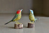 Red and Blue Spotted Woodpecker carved bird sculptures from Brazil.