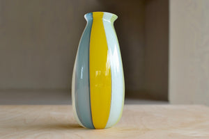 Alterate side view of Robin Mix Small Flat Cane and multi color vase.