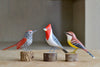 Striped Choca, Red Cardinal and Antwern bird sculptures.