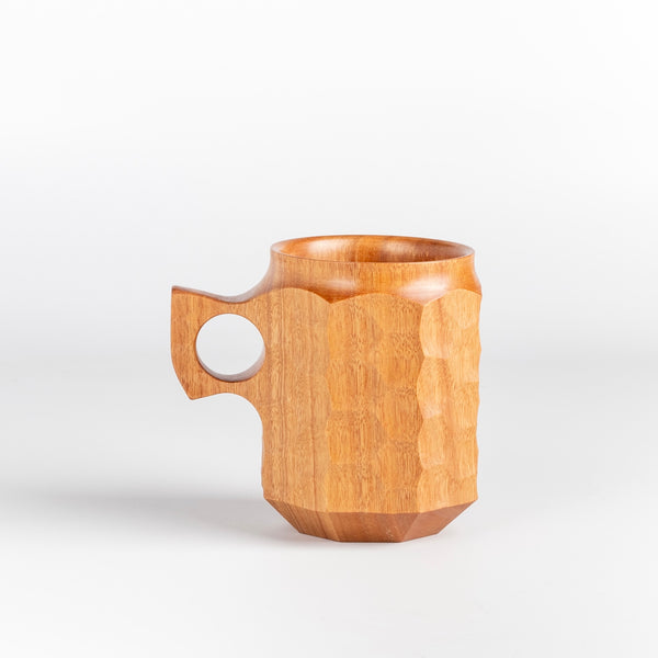 Large Wood Jin cup from Akihiro Woodworks is a hand carved mug in Tabunoki. The wood will darken over time. Made by Akihiro Woodworks in Kagoshima, Japan.