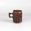 Jincup Urushi Large from Akihiro Woodworks is carved out of Tabunki wood. It takes five years to dry and can only be made in limited quantities to remain sustainable. This mug is made with Fuki-urushi lacquer, also called suri-urushi, a traditional and durable finishing technique where raw, liquid lacquer (tree sap), is rubbed into the wood grain with a cotton cloth and then wiped off, repeating the process multiple times to enhance the natural wood texture while providing a protective (us