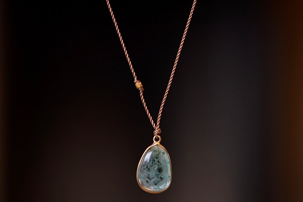 
            
                Load image into Gallery viewer, Unusual Emerald Pendant Necklace with Inclusions by Margaret Solow set in 14k gold.
            
        