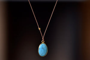 
            
                Load image into Gallery viewer, Sleeping Beauty Turquoise Pendant Necklace by Margaret Solow. Set in 18k yellow gold.
            
        