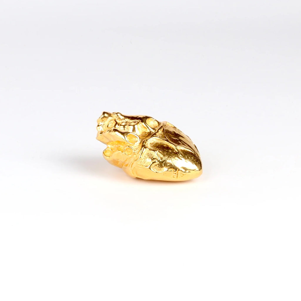 Bronze Object "Heart of Gold" by Anne Ricketts.