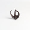 Bronze Object "Coming Home" (flying swallow) on white background by Anne Ricketts.