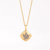 The Bird Sliding Locket by Arman Sarkisyan in 22k gold on white background.