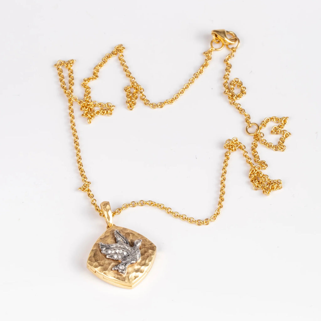 The Bird Sliding Locket by Arman Sarkisyan on white background.