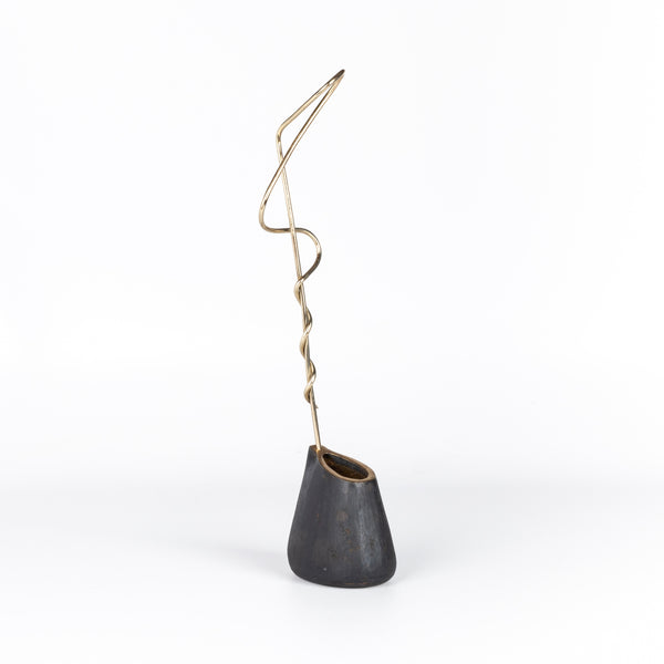 Aubock Vase 7240 Single Noose is a brass vase with patinated body, polished rim and rod. Designed by Carl Auböck and handmade in Austria. Founded in 1906, the workshop is still owned and operated by the Auböck family (by Carl IV and V) from its original home, in a Vienna townhouse.
OK has the largest selection of current Werkstätte Auböck production in the US and in stock, ready to ship.