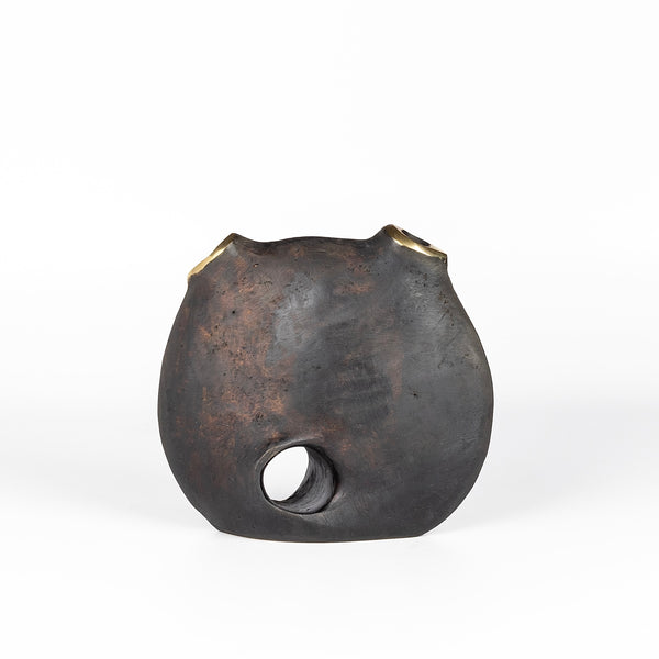 Aubock Vase 3789 Moon is a brass vase with patinated body and polished rim.
Designed by Carl Auböck and handmade in Austria. Founded in 1906, the workshop is still owned and operated by the Auböck family (by Carl IV and V) from its original home, in a Vienna townhouse.
OK has the largest selection of current Werkstätte Auböck production in the US and in stock, ready to ship.