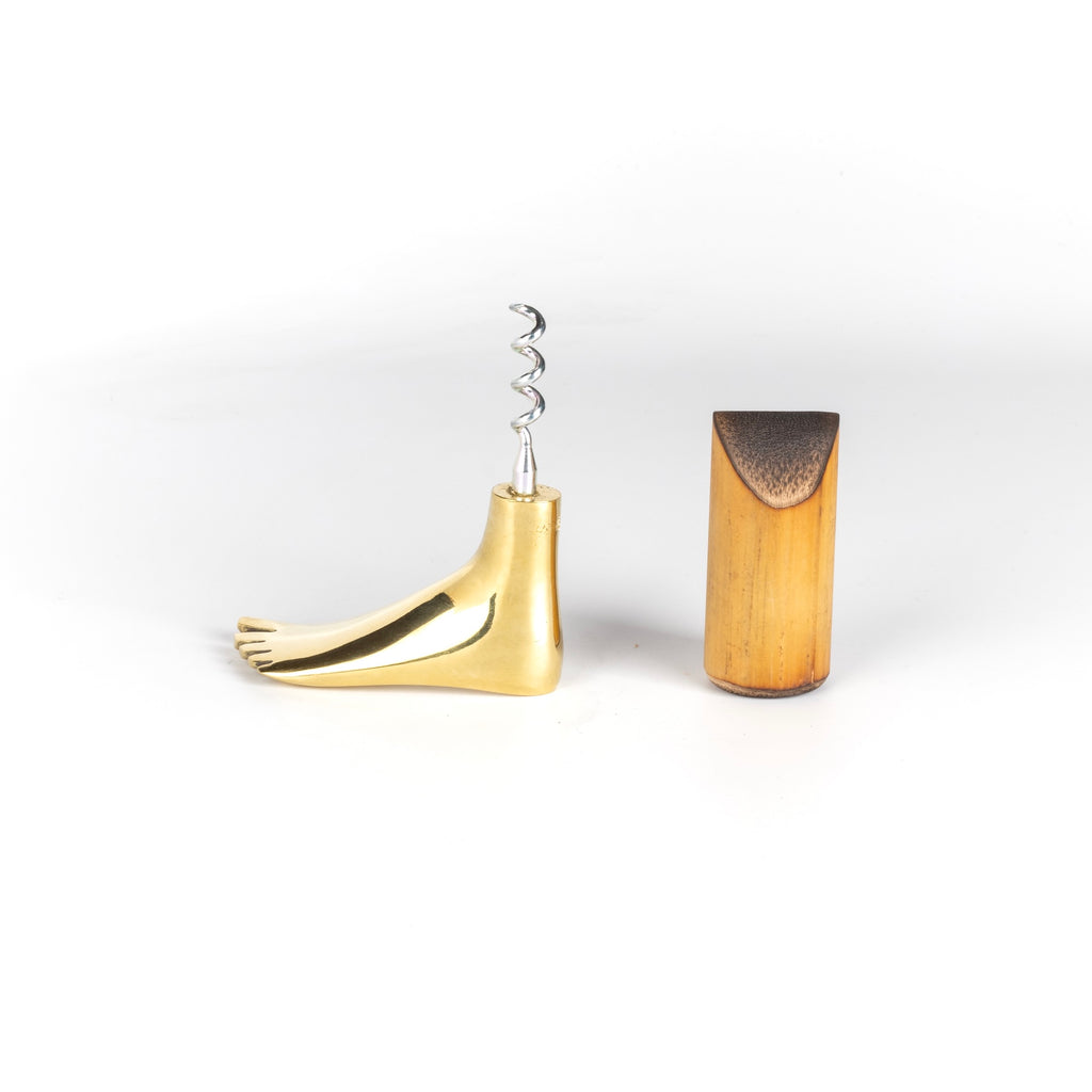 Werkstette Carl Aubock Corkscrew 4275 Foot in polished brass on white.