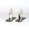 Front view of Carl Aubock Bookends 1928 Hands bookends are polished and hand shape bookends 1928 with patinated base. Designed by Carl Auböck and handmade in Austria.