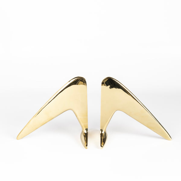 Aubock Bookends 4630 Hook are bookends in polished brass. Designed by Carl Auböck and handmade in Austria. Founded in 1906, the workshop is still owned and operated by the Auböck family (by Carl IV and V) from its original home, in a Vienna townhouse. OK has the largest selection of current Werkstätte Auböck production in the US and in stock, ready to ship.