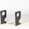 Side view of Aubock Bookends 3785 Urban Legend are sculptural bookends in patina with polished brass base. 