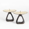 Aubock Candle Holders 3470 with open base are a set of candle holders with open patina brass base and polished top. Designed by Carl Auböck and handmade in Austria. Founded in 1906, the workshop is still owned and operated by the Auböck family (by Carl IV and V) from its original home, in a Vienna townhouse. OK has the largest selection of current Werkstätte Auböck production in the US and in stock, ready to ship.