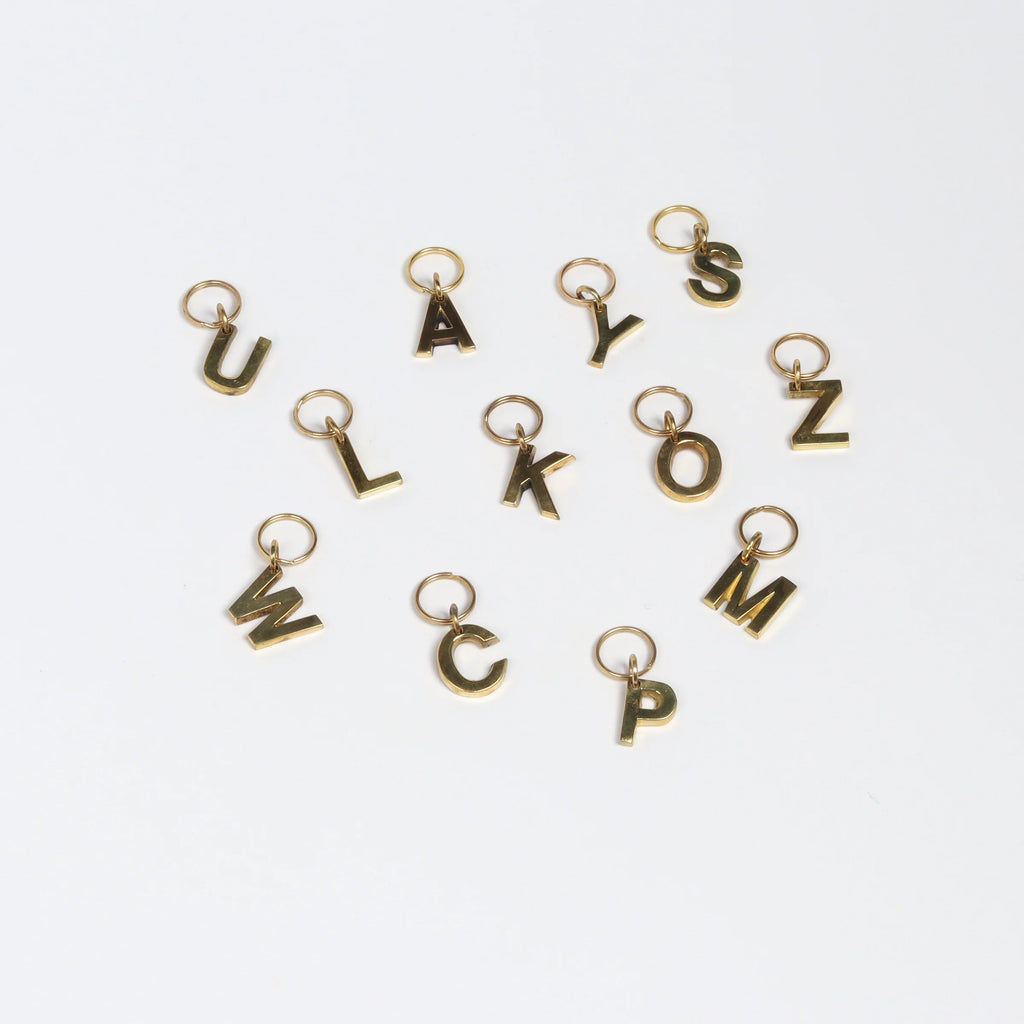 Full set of brass letter keyrings, key rings, key chains in brass by Carl Aubock.