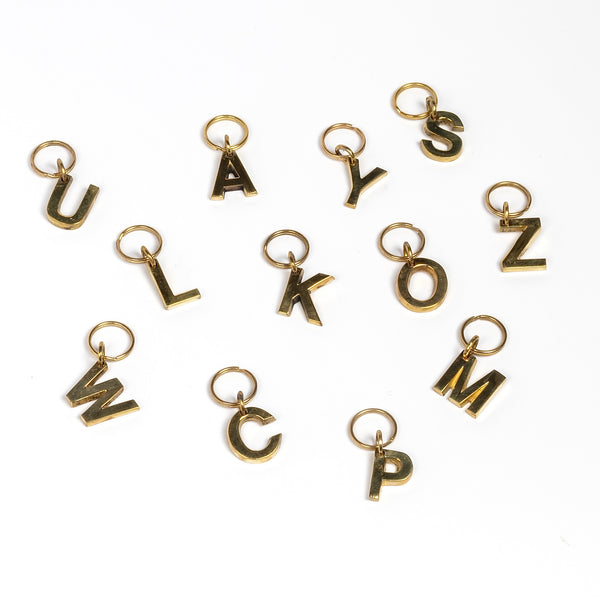 Full set of brass letter keyrings, key rings, key chains in brass by Carl Aubock.