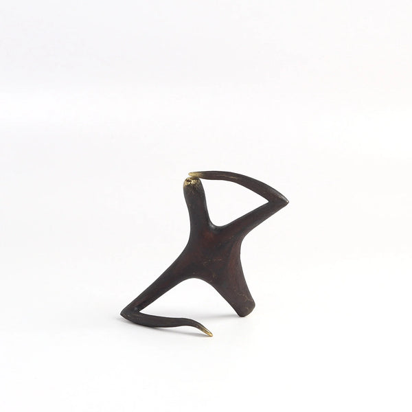 Werkstatte Carl Aubock sculpture Pessmist / Optimist 4059 on white background.