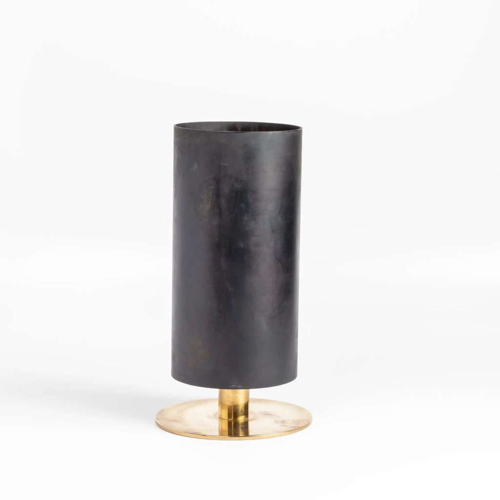 The Aubock Vase on Pedestal in Large 7247-6 is a thin rimmed patinated brass tube vase with polished base in large designed by Carl Auböck.