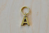 'A' Letter keyring, key chain, key ring in brass made by Carl Aubock. 