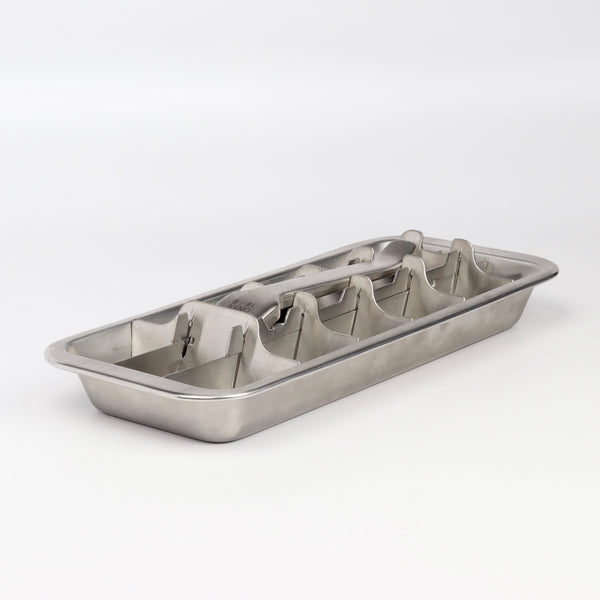 Classic  'Old School' stainless steel and pull up ice cube tray on white background 