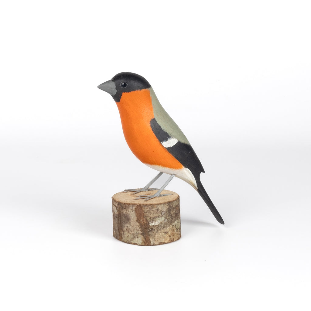 Peito Anaranjado Bird from Brazil is a beautifully made fair trade wood bird modeled after birds from the region, this artisan makes them from reclaimed wood and supports his family by their production. 