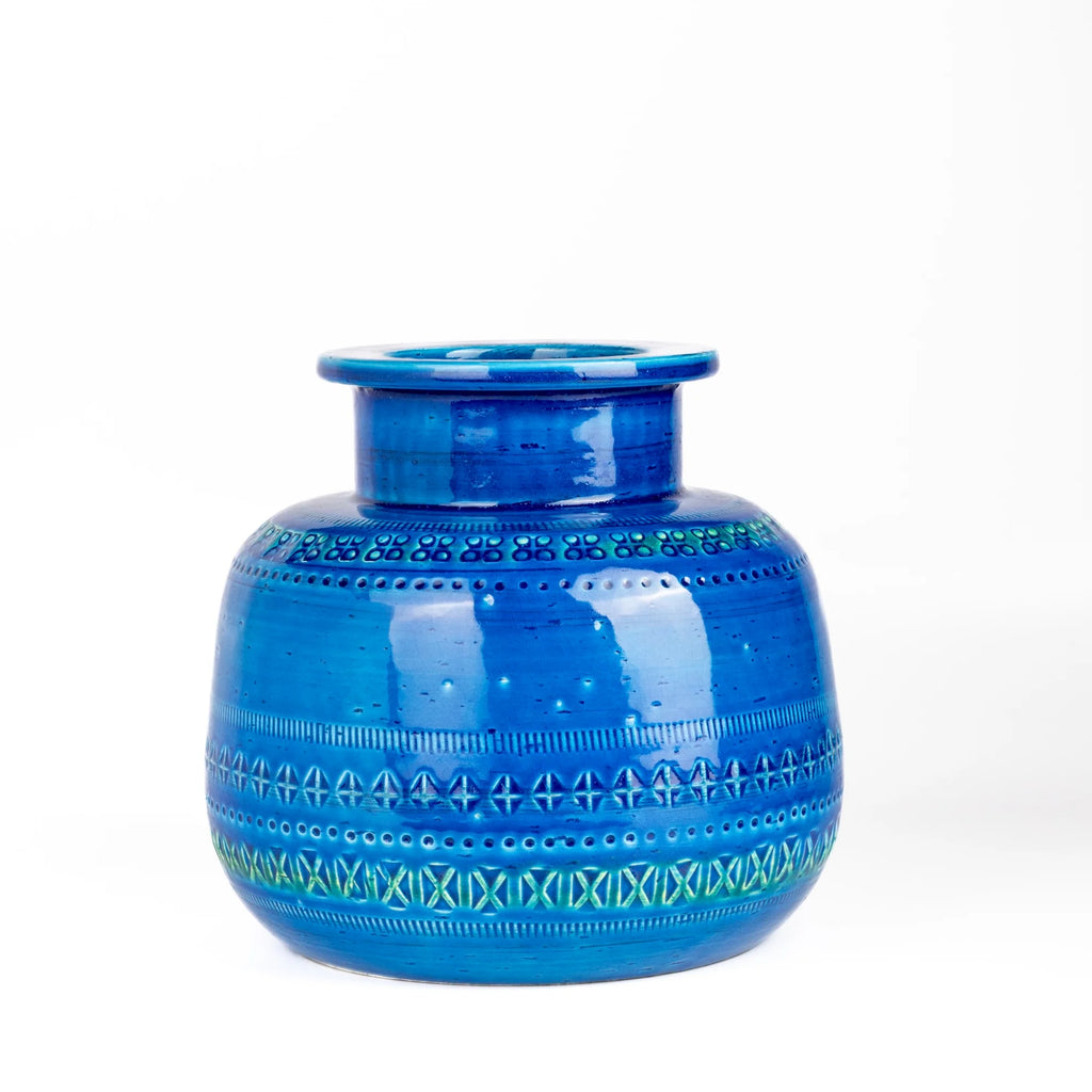 Rimini Blu Rochetto Vase is a ZZ999 Current production of the "Rimini Blu" series. Designed between 1955 and 1965 by by Aldo Londi. This vase is hand made in Italy and one of a kind, made in ceramic earthenware and with a blue glaze.