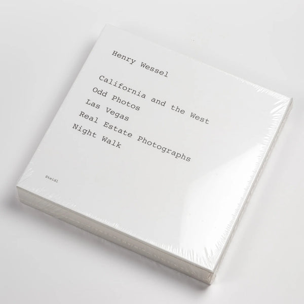 V Book Henry Wessel Steidl Five Books Slipcase From renowned photographer Henry Wessel come five photo stories on the landscape of Southern California and the American West taken between the 1970s and the early 2000s. California and the West, Odd Photos, Las Vegas, Real Estate Photographs and Night Walk are slipcased in this first collaboration with Steidl. A mint and out of print five book set in slipcase are available.