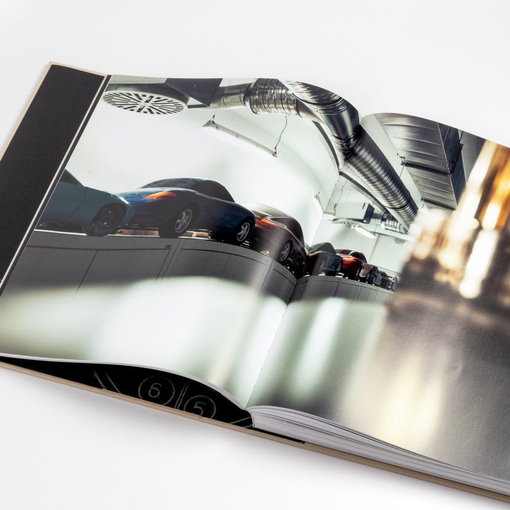 Page from Artifacts Porsche Book published by ERG showing porsche vehicles.