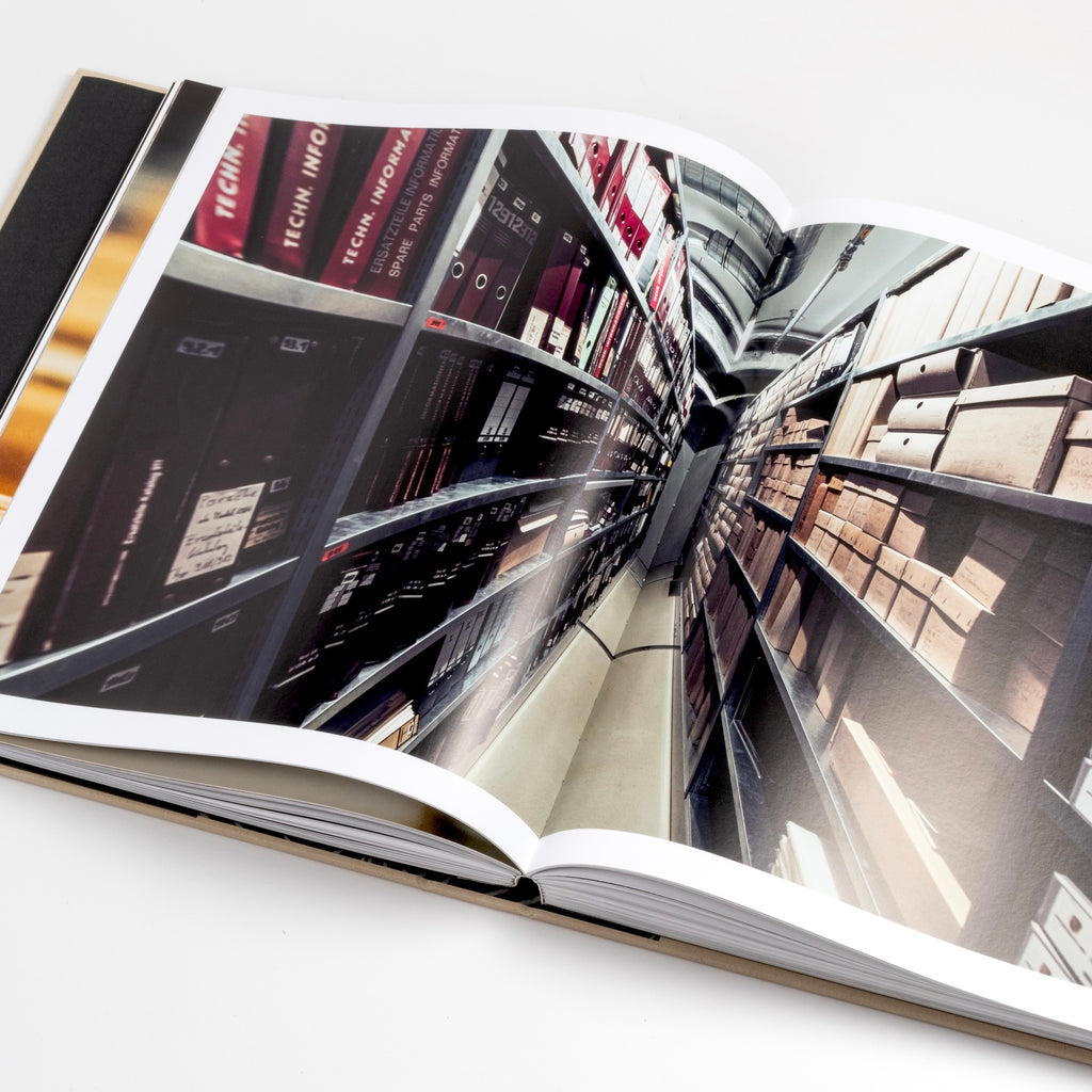 Page from Artifacts Porsche Book published by ERG showing porsche archives.