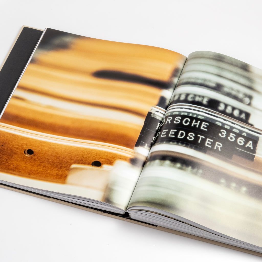 Page from Artifacts Porsche Book published by ERG showing porsche archives.