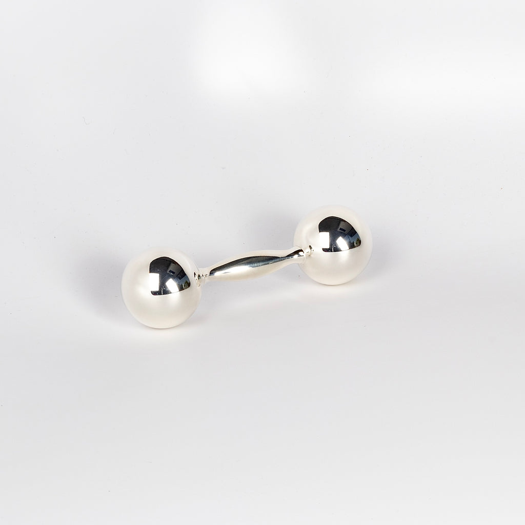 Harmony Ball Rattle in German silver and sterling designed by Noel Wiggins for Areaware.