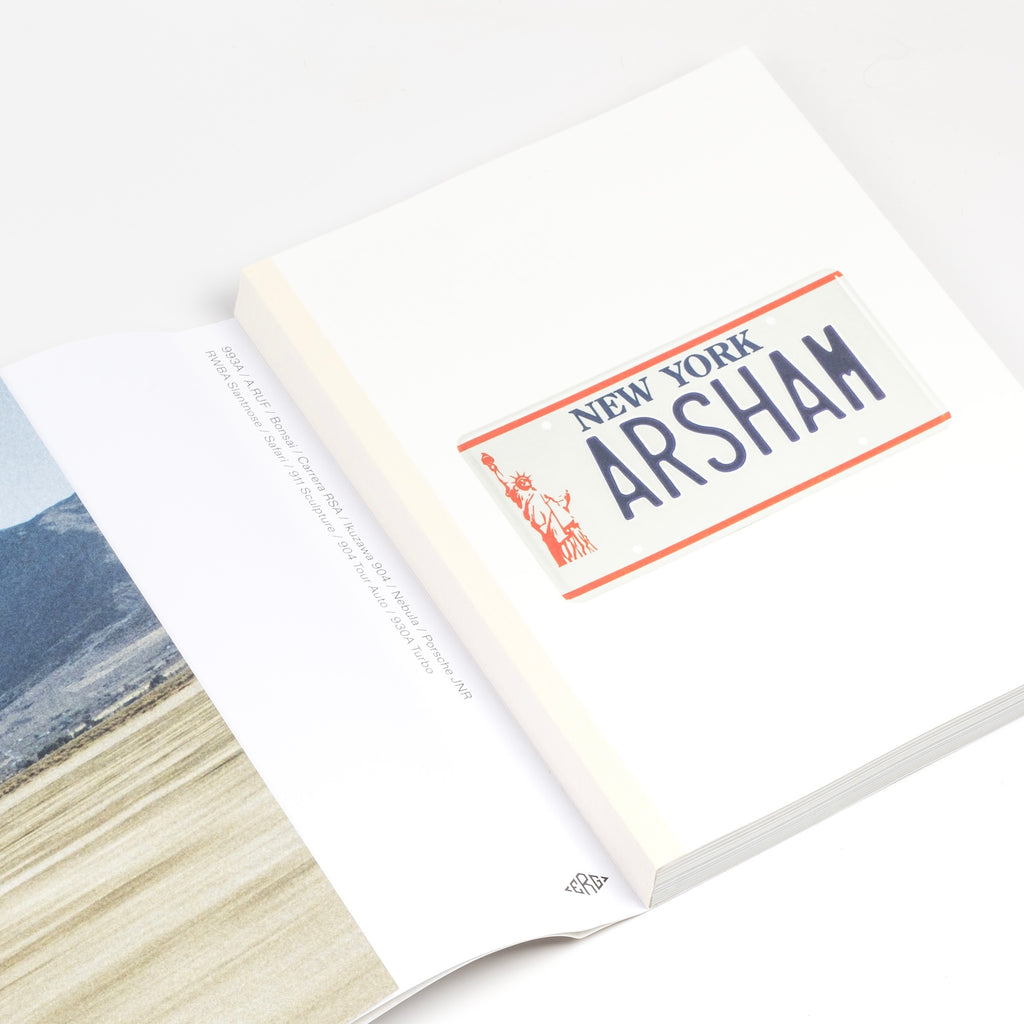 Detail of First Edition Arsham Motorsport Porsche and art book from ERG Media and Daniel Arsham.