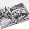 Page from Bart Kuykens 10th Anniversary photo book on orsche drivers and their cars.